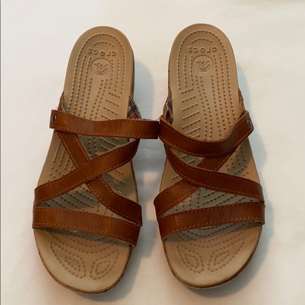 Women’s crocs slip on brown leather wedges, size 9